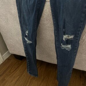 Women's Distressed Blue Jeans